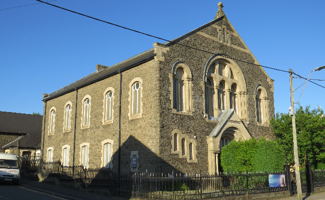 Church in Merthyr Tydfil. It is vaguely brown, very cuboid, and has some nice arches in the windows.